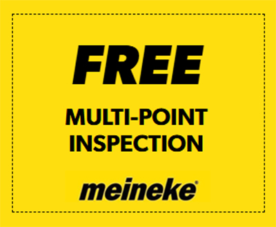 Yellow promotional sign with bold black text: 'FREE MULTI-POINT INSPECTION' and the Meineke logo.